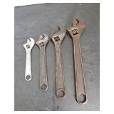 Four Adjustable Wrenches