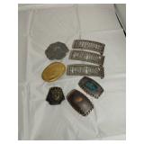Seven Belt Buckles
