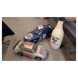Two Blow Up Cars and Malibu Display Bottle