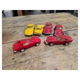 Six Plastic Toy Cars