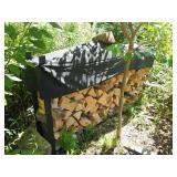 Stacked Firewood With Black Cover