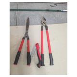 Three Garden Hand Tools with Red Handles