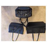 Three purses including Michael Kors
