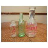 Sanida and Embossed Dairy Bottles