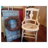 Painted Cane-Seat Chair and Rustic Wall Decor