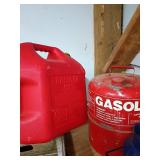 Two Red Gasoline Cans, Plastic and Metal