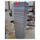Stack of Gray Garbage Cans 18x18x30 Inches