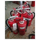 Seven Fire Extinguishers