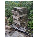 Stack of Used Treated Lumber Timber Blocks