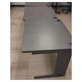 Three Gray Metal Computer Desks