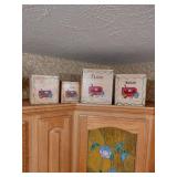 Four Hand-Painted Wooden Canisters