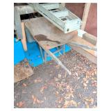 Wheelbarrow and Two Wooden Saw Horses