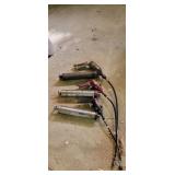Three pneumatic grease guns