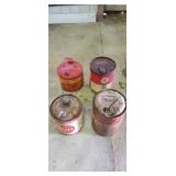 Lot of four antique fuel and oil cans