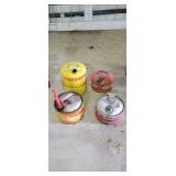 Lot of four antique fuel cans