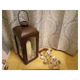 Metal Lantern With Candle And Shell Decor