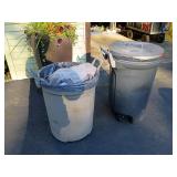 Two garbage cans- one with heavy duty lid