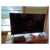 TCL 43" Roku tv, LG Blu-ray player, VHS DVD player