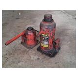 Two Used Red Hydraulic Bottle Jacks