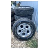 (5)  Bridgestone Jeep Tires and Rims P255/70R18