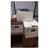 5 boxes of folders and clinical folders