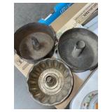 THREE ANTIQUE BUNDT PANS THREE ANTIQUE BUNDT PANS