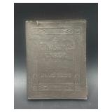 Vintage, miniature leather-bound edition of A