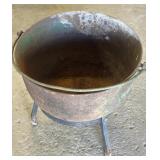 Vintage cast iron cauldron bean pot on stand