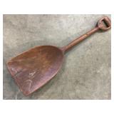 Primitive wooden scoop shovel