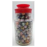 Decorative glass jar of marbles