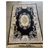 5.5x9ft black floral oriental rug