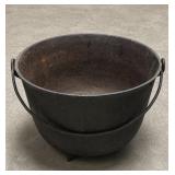 Vintage cast iron cauldron bean pot