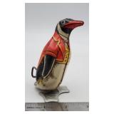 Vintage tin lithograph wind-up waddling penguin