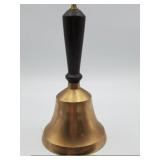 Vintage brass school bell with a wooden handle