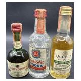 Three vintage miniature bottles
