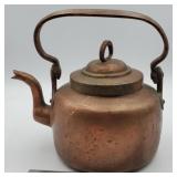 Antique copper tea kettle