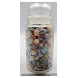 Decorative glass jar of marbles