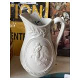White Pottery Pitcher with Angels