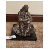 'Hold It Together' Religious Statue