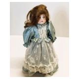 Antique Porcelain Head Doll in Blue Lace Dress