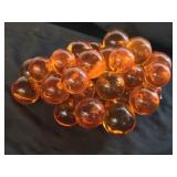Large Cluster of Orange Lucite Grapes on Vine