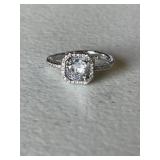 Halo Style White Sapphire Engagement Ring