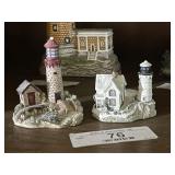 Pair of Stamped Lighthouse Collectibles
