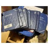 Stack of Coin Set Books