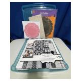 Container of Scrapbooking Paper