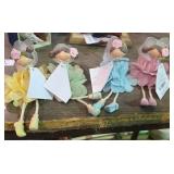 Shelf of Wooden Dolls