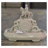 Small White Porcelain Figurine