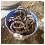 Bucket of Used Horse Shoes