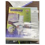 Two Uni-Keep View Case Binders