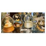 Four Snow Globes